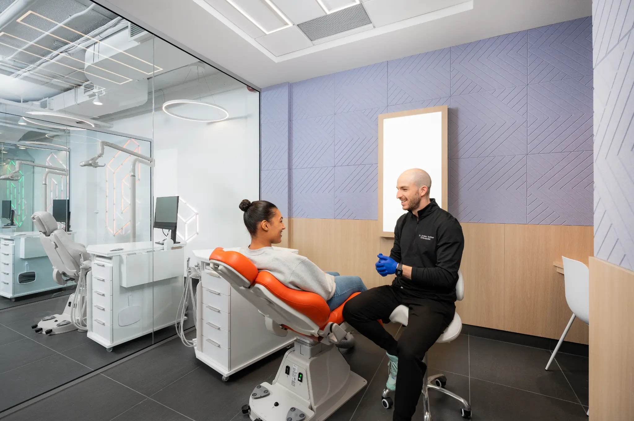 Dr. Seetner consulting with a patient in the modern clinic